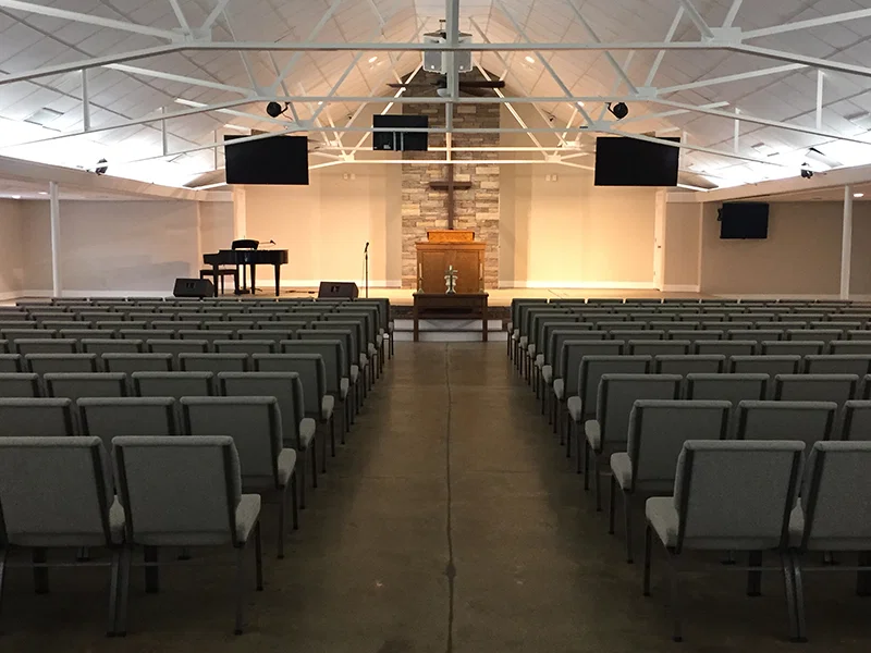 Majestic indoor chapel interior with cross